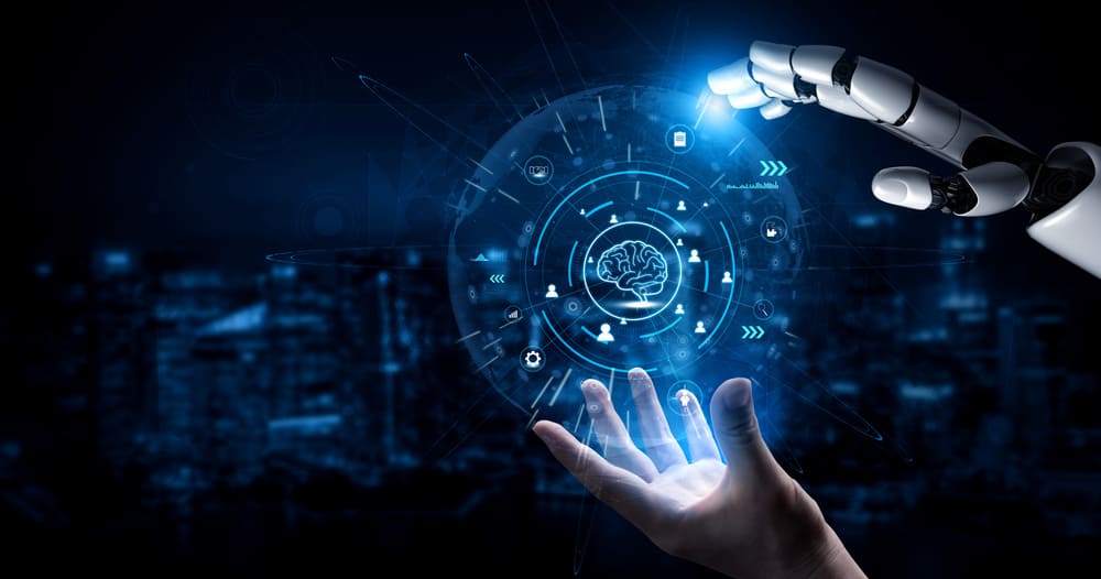 Interação entre mão humana e robô diante de interface digital com cérebro artificial, com ilustrações que representam diferentes tipos de inteligência artificial.